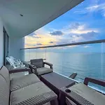 Amanecer frente al mar azul - Descanso 16